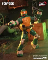 9. Figurka TMNT Wojownicze Żółwie Ninja Michelangelo Page Punchers